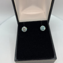 Load and play video in Gallery viewer, 1ct Cyan Moissanite Luxury Sterling Silver 925 Stud Earrings
